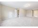 Spacious bonus room with plush carpeting, neutral walls, and ample natural light at 1987 Meadowview Dr, Graham, NC 27253