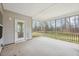 Relaxing screened porch with an outside view at 1987 Meadowview Dr, Graham, NC 27253