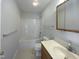 Functional bathroom featuring a shower-tub combo and vanity with ample storage at 207 Lawrence St, Fuquay Varina, NC 27526