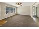 Large living room with a large window providing plenty of natural light at 207 Lawrence St, Fuquay Varina, NC 27526