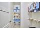 Organized walk-in closet with shelves, hanging rods, and ample storage space at 240 Seaforth Landing Dr, Pittsboro, NC 27312
