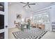 Bright and airy office space with vaulted ceilings, large rug, and natural light at 240 Seaforth Landing Dr, Pittsboro, NC 27312