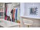 Elegant walk-in closet featuring a vanity area and custom storage solutions at 240 Seaforth Landing Dr, Pittsboro, NC 27312