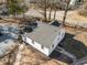 Aerial view of a home highlighting new roof, siding, and freshly landscaped yard at 2504 E East Geer St, Durham, NC 27704