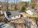 Aerial view of a quaint home with a detached unit and newly paved driveway at 2504 E East Geer St, Durham, NC 27704