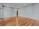 Finished basement area with wood-look floors, neutral walls, and recessed lighting at 2600 Buckingham Dr, Sanford, NC 27330