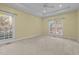 Spacious bedroom with tray ceiling and large windows at 2600 Buckingham Dr, Sanford, NC 27330