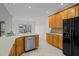 Spacious kitchen featuring a large island and modern stainless steel appliances at 2600 Buckingham Dr, Sanford, NC 27330