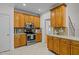 Well-lit kitchen with stainless steel appliances and mosaic tile backsplash at 2600 Buckingham Dr, Sanford, NC 27330