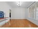 Bright living room featuring hardwood floors, large windows, and ample natural light at 2600 Buckingham Dr, Sanford, NC 27330