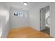 This room has hardwood floors and a window providing natural light at 2600 Buckingham Dr, Sanford, NC 27330