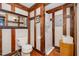 Bright bathroom featuring a toilet, stacked washer/dryer, and stylish accents at 2609 Pleasant Hill Liberty Rd, Liberty, NC 27298