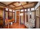 Comfortable bedroom featuring exposed wood beams and accents, and a writing desk at 2609 Pleasant Hill Liberty Rd, Liberty, NC 27298