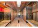 Rustic bunkhouse interior with wooden ceiling, bed frames and dark wooden trim for a camp-like experience at 2609 Pleasant Hill Liberty Rd, Liberty, NC 27298