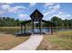 Lakeside dock pavilion offers a scenic view and relaxing spot with chairs for enjoying the water at 2609 Pleasant Hill Liberty Rd, Liberty, NC 27298
