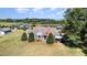 Charming home with large yard, mature trees, and outbuildings, exuding curb appeal at 2609 Pleasant Hill Liberty Rd, Liberty, NC 27298