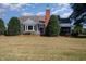 Charming home with mature landscaping and a cozy screened-in porch at 2609 Pleasant Hill Liberty Rd, Liberty, NC 27298