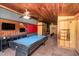 Basement game room featuring a pool table, wooden ceiling, and rustic design for fun and entertainment at 2609 Pleasant Hill Liberty Rd, Liberty, NC 27298
