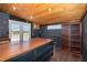 Versatile interior space featuring wood accents, natural light, and exterior access at 2609 Pleasant Hill Liberty Rd, Liberty, NC 27298