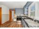 Traditional kitchen features blue cabinets, black countertops and stainless steel appliances at 2609 Pleasant Hill Liberty Rd, Liberty, NC 27298