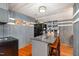 Open kitchen with stainless appliances, a bar-style seating area, and a refrigerator at 2609 Pleasant Hill Liberty Rd, Liberty, NC 27298