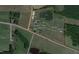 Aerial property map displaying layout including house, pond, barn, and wooded acreage at 2609 Pleasant Hill Liberty Rd, Liberty, NC 27298