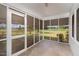 Charming screened porch offering scenic views of the surrounding landscape at 2609 Pleasant Hill Liberty Rd, Liberty, NC 27298