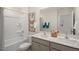 Bathroom featuring double sinks, a shower, and butterfly art at 261 Holton St, Smithfield, NC 27577