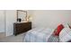 Bedroom featuring a bed and dresser, offering plenty of storage at 261 Holton St, Smithfield, NC 27577