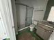 Modern bathroom featuring a glass-enclosed shower, toilet, and vanity with a sleek countertop and fixtures at 304 Chesapeak Commons St # 146, Garner, NC 27529