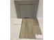 Image showcasing the interior design palette for this property, including floor, counter, and cabinet finish samples at 304 Chesapeak Commons St # 146, Garner, NC 27529