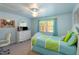 Bedroom featuring bright walls, a ceiling fan, a comfy bed, and stylish decor at 4009 Brittabby Ct, Raleigh, NC 27606