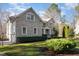 Beautiful two-story home with attached garage and lush green lawn at 4009 Brittabby Ct, Raleigh, NC 27606