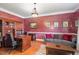 Elegant office space with hardwood floors, custom built-ins, and comfortable seating at 4009 Brittabby Ct, Raleigh, NC 27606