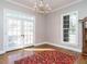 Classic dining room featuring hardwood floors, a vintage rug, and chandelier at 4063 Nc-39, Selma, NC 27576
