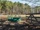 Pasture with a feeding ring and gated fence line at 4063 Nc-39, Selma, NC 27576