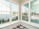 Bright sunroom with large windows offering views of the surrounding property at 4063 Nc-39, Selma, NC 27576