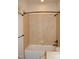 Bathroom with shower and bathtub combination, and tiled walls at 4305 Albino Deer Way, Wake Forest, NC 27587
