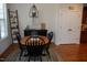 Charming dining area featuring hardwood floors and lots of natural light at 4305 Albino Deer Way, Wake Forest, NC 27587