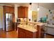 Well-appointed kitchen featuring granite countertops, stainless steel appliances, and ample cabinet space at 4305 Albino Deer Way, Wake Forest, NC 27587
