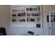 Office space with built-in bookshelves and storage cabinets at 4305 Albino Deer Way, Wake Forest, NC 27587