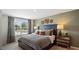 Serene bedroom showcasing a stylish bed, neutral tones, and decorative accents at 452 Belgian Red Way, Wake Forest, NC 27587