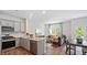 Open floor plan combines kitchen, living and dining areas, perfect for entertaining at 452 Belgian Red Way, Wake Forest, NC 27587