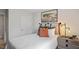 Cozy bedroom with stylish lamp, textured bedding, and neutral decor at 456 Belgian Red Way, Wake Forest, NC 27587