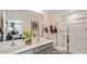 Well-lit primary bathroom featuring double sinks, framed mirror and a glass enclosed shower at 461 Belgian Red Way, Wake Forest, NC 27587
