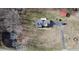 Bird's eye view displays the home and its private location surrounded by mature trees at 466 Oren Gaines Rd, Goldston, NC 27252