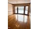 Spacious dining room featuring hardwood floors, a chandelier, and a large bay window at 466 Oren Gaines Rd, Goldston, NC 27252