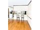 Open dining room featuring hardwood floors that transition into the kitchen at 466 Oren Gaines Rd, Goldston, NC 27252