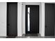 Modern entryway with black doors, stylish hardware, and clean design at 4908 Birchleaf Dr, Raleigh, NC 27606