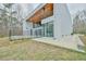 This modern home has a backyard with a pool, covered patio, and lots of green space at 4908 Birchleaf Dr, Raleigh, NC 27606